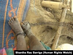 This 2012 photo shows Victoria, a 10-year-old girl with a mental disability who was put in Jesus Divine Temple (Nyakumasi) Prayer Camp, where she was chained to a tree all day. © 2011 Shantha Rau Barriga/Human Rights Watch