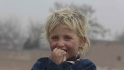 An Afghan refugee girl plays in the Kabobayan refugee camp, Peshawar, Pakistan. After 40 years, more than 1.5 million Afghan refugees still live in neighboring Pakistan. But for the first time in years, there’s a faint hope of returning home. (2/13/2020)