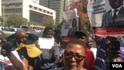 Thokozani Khupe is the vicThokozani Khupe is the vice president of the main opposition party, the Movement for Democratic Change talking to reporters at Parliament. She says her party is happy that it has finally dawned on ZANU-PF that this is the hour that has dawned that Mugabe must go, Nov. 21, 2017. (S. Mhofu/VOA)