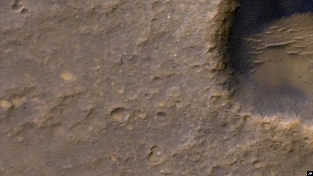 Bright dot near lower-left corner of image is three-petal lander platform from 2004 mission, Feb. 9, 2012.