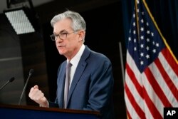 FILE - Federal Reserve Chair Jerome Powell speaks during a news conference in Washington, March 3, 2020.