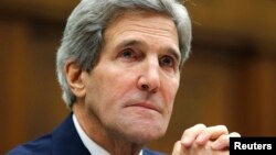 FILE - U.S. Secretary of State John Kerry testifies before the House Foreign Affairs Committee on Capitol Hill in Washington, Dec. 10, 2013. 