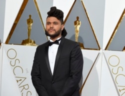 FILE - The Weeknd arrives at the Oscars on February 28, 2016, at the Dolby Theatre in Los Angeles.