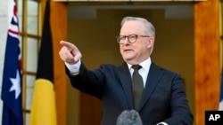 Australian Prime Minister Anthony Albanese gestures during a news conference at Parliament House in Canberra, Dec. 20, 2024. 