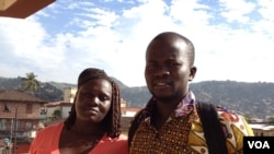 Ebola survivors Massah Stevens and Yusif Koroma stand outside the Sierra Leone association of Ebola survivors, in Freetown, Sierra Leone, Jan. 6, 2016. (Nina Devries /VOA) 