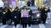 FILE - Activist Yoon Meehyang, center left, marches toward the Japanese Embassy during a funeral ceremony of Kim Bok-dong, a former South Korean sex slave, in Seoul, South Korea, on Feb. 1, 2019. 