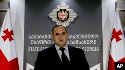 FILE - Georgian security service investigator Savle Motiashvili speaks during a news conference in Tbilisi, Georgia, April 18, 2016. On Thursday, he announced the arrest of five Georgian citizens in connection with an attempt to sell uranuim.