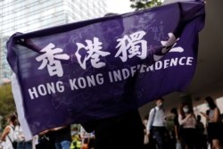 Algunos de los manifestantes del 9 de junio de 2020 pedían independencia para Hong Kong.