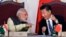 FILE - Indian Prime Minister Narendra Modi, left, talks with Chinese President Xi Jinping during the BRICS summit in Goa, India, Oct. 16, 2016. China and India may have ended a tense border standoff for now, but their longstanding rivalry raises questions