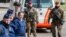 Belgian police men and soldiers secure the area outside Zaventem Airport in Brussels, March 29, 2016. 