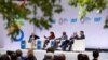 FILE - Andrea Shalal moderates an IMF roundtable on tackling public debt, during IMF Spring Meetings at the International Monetary Fund Building in Washington, U.S. April 12, 2023. 