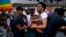 Cuban police detain gay rights activists taking part in an unauthorized march in Havana, May 11, 2019. The march was organized largely using Cuba's new mobile internet.