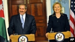 U.S. Secretary of State Clinton and Jordanian Foreign Minister Judeh speak to the press following their bilateral meeting at the Department of State, January 26, 2011