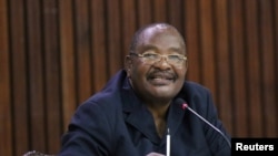 FILE - Obert Mpofu, then Zimbabwe's minister of home affairs, is pictured at a meeting in Harare, Zimbabwe, Nov. 19, 2017. 