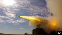 22일 러시아 남부 아슈루크 기지에서 실시된 미사일 발사 훈련 장면을 러시아 국방부가 공개했다. 러시아 주도의 연합훈련에 중국과 벨라루스, 미얀마 등이 참가했다. 