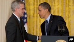 President Barack Obama shakes hands with current Deputy National Security Adviser Denis McDonough after he announced he will name McDonough as his next chief of staff, in the East Room of the White House in Washington, January 25, 2013. (AP)
