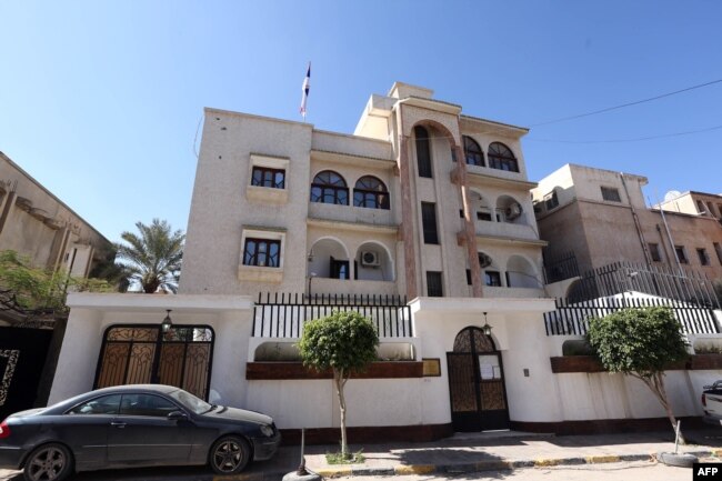 FILE - A view of the Serbian Embassy in Tripoli, Libya, Feb. 21, 2016. The day before, Libya's internationally recognized government condemned a U.S. airstrike west of Tripoli in Sabratha, believed to have killed Islamic State operative Noureddine Chouchane and dozens of others, calling it a violation of Libyan sovereignty. The strike also killed two kidnapped Serbian Embassy employees.