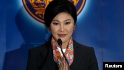 Bà Yingluck từng đứng đầu ủy ban giám sát chương trình trợ giá gạo và đang đối mặt với những cáo giác phạm tội bất cẩn.