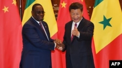 Le président chinois Xi Jinping et le président sénégalais Macky Sall lors d'une rencontre en Chine, le 2 septembre 2016.