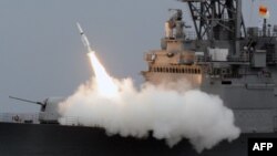 FILE - A Taiwan navy Kidd-class destroyer launches an SM-2 surface-to-air missile during a drill near the east coast of Taiwan, Sept. 26, 2013. The Pentagon announced May 17, 2019, that a possible sale of $314 million worth of the missiles to South Korea had been approved.