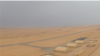 Hangars and an airstrip are seen at a new U.S.-constructed air base at a remote desert location in Niger (screengrab from U.S. Department of Defense video)