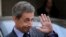 FILE - Nicolas Sarkozy, former French president and head of the conservative "Les Republicains" party, is seen leaving after a meeting with French President Francois Hollande at the Elysee Palace, in Paris, Jan. 22, 2016.