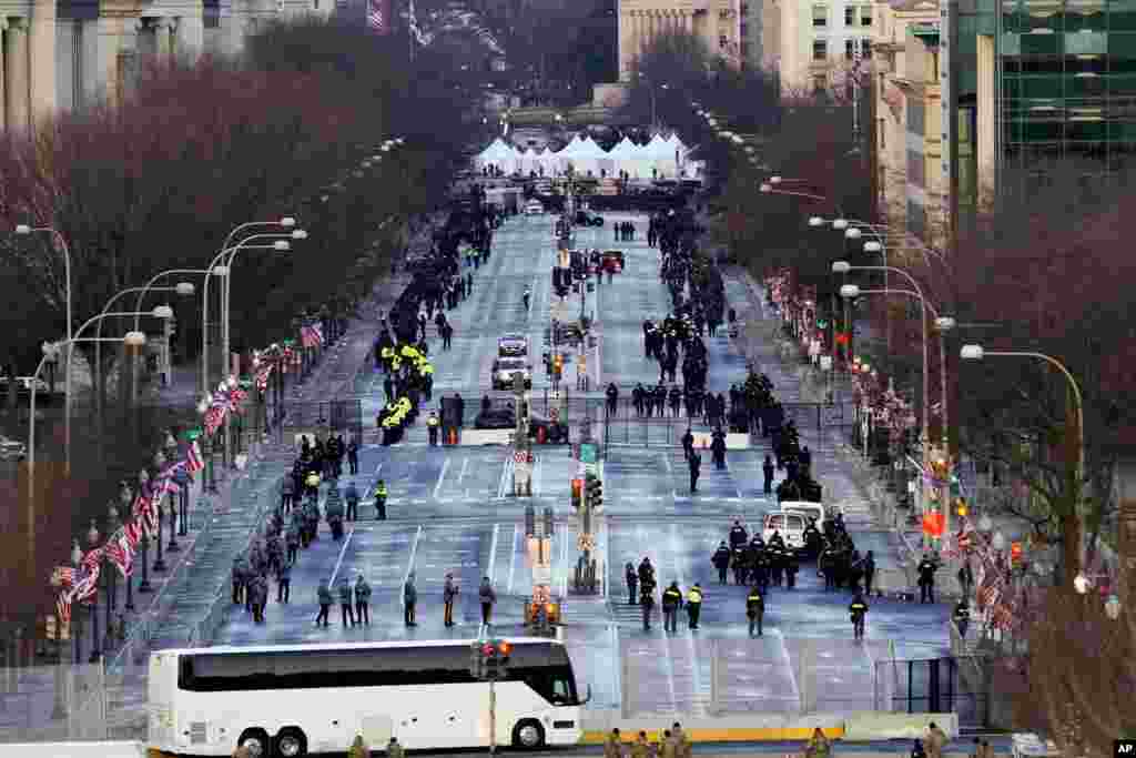 Security is set up along Pennsylvania Avenue before the presidential inauguration at the U.S. Capitol in Washington.