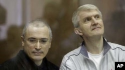 Michail Khodorkovsky and Platon Lebedev on October 2, 2010.