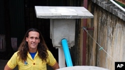 Cordell Jacks, who heads IDE Cambodia's water and sanitation program, stands next to one of the award-winning EZ Latrines that the charity hopes will help improve sanitation in rural Cambodia