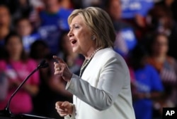 Democratic presidential candidate Hillary Clinton addresses supporters at her Super Tuesday election night rally in Miami, March 1, 2016.