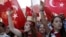 Demonstrators wave Turkish flags as they shout nationalist slogans during a protest against Kurdistan Workers' Party (PKK) in central Istanbul, August 16, 2015. 