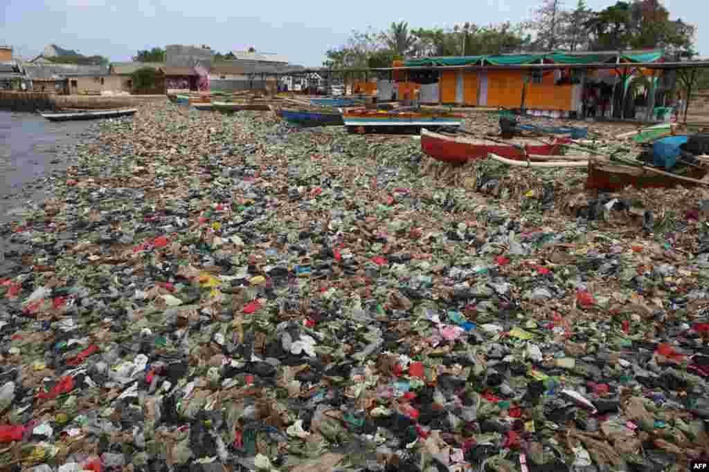 Plastic waste is seen choking Sukaraja beach in Bandar Lampung, Indonesia.