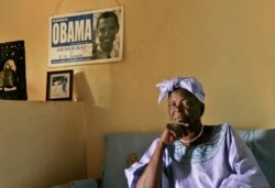 In this Tuesday, Feb. 5, 2008, file photo, Sarah Obama, step-grandmother of then U.S. Democratic presidential hopeful Barack Obama, sits in the living room of her house in the village of Kogelo, near the shores of Lake Victoria, in western Kenya..