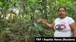 Melissa Espinoza Paez talks about medicinal plants at the Siwakabata agro-ecology farm in Talamanca, Costa Rica, May 10, 2018.