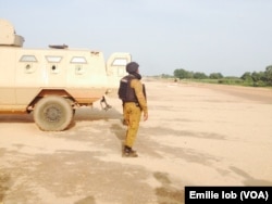 Burkina Faso's army took up positions outside the presidential guard's camp in the capital Ouagadougou, Sept. 29, 2015. The elite unit -- known as the Presidental Security Regiment (RSP) -- has refused to disarm after the short-lived coup last week.