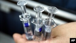 Nyanzvi munezvehutano pasi pose dzirikutsvaka mushonga wekurwisa coronavirus