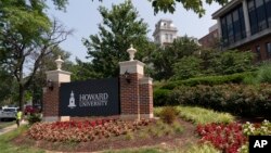 FILE - In this July 6, 2021, file photo, an electronic signboard welcomes people to the Howard University campus in Washington. Howard is one of more than 100 HBCUs recognized by the U.S. Department of Education. (AP Photo/Jacquelyn Martin, File)