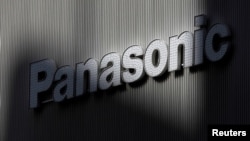 FILE - Panasonic's logo is seen on a wall of an electronic shop in Tokyo, Japan.