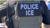 A member of U.S. Immigration and Customs Enforcement is seen in this screen grab from a VOA Spanish video.