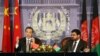 Chinese Foreign Minister Wang Yi, left, speaks during a press conference with his Afghan counterpart Zarar Ahmad Osmani at the foreign ministry in Kabul, Afghanistan, Feb. 22, 2014.
