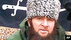 FILE - In this screen shot taken in Moscow shows an undated photo of a man identified as Chechen separatist leader Doku Umarov, posted on the Kavkazcenter.com site.