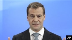 Russian President Dmitry Medvedev speaks during a news conference at a business school in Skolkovo, outside Moscow, Russia, May 18, 2011