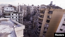 Gedung-gedung yang hancur di pinggiran selatan Beirut setelah gencatan senjata antara Israel dan Hizbullah, di Lebanon, 6 Desember 2024. (Foto: Amr Abdallah Dalsh/Reuters)