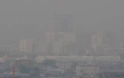 A thick layer of smog covers central Bangkok, Thailand, Jan. 20, 2020.