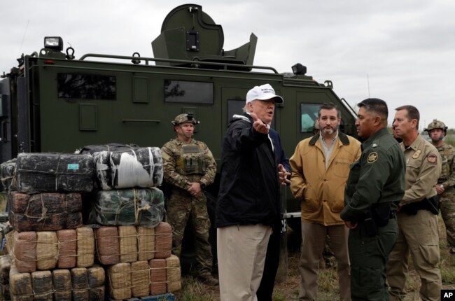 President Donald Trump tours the U.S. border with Mexico at the Rio Grande on the southern border in McAllen, Texas, Jan. 10, 2019.