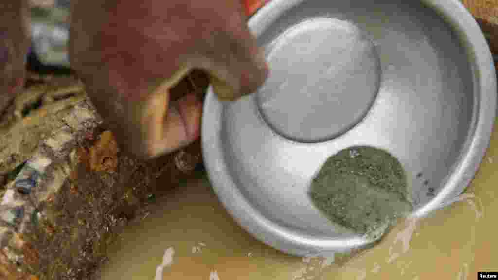 Crushed rock samples, that is thought to contain gold, is washed at a mine in Minna, Niger State.