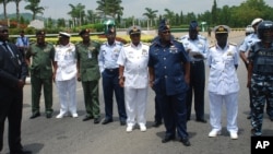 FILE - Members of Nigeria's military leadership are seen in a May 26, 2014, photo in Abuja, Nigeria.