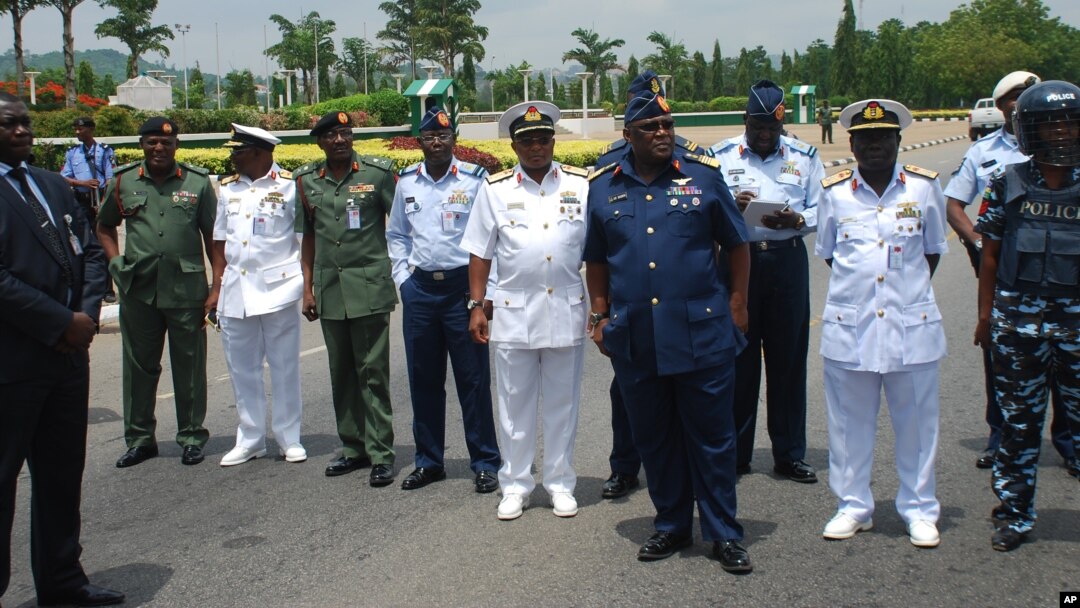 FILE - Members of Nigeria's military leadership are seen in a May 26, 2014, photo in Abuja, Nigeria.