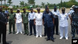 FILE - Members of Nigeria's military leadership are seen in a May 26, 2014, photo in Abuja, Nigeria.