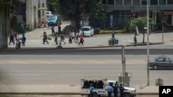 Security forces stand guard in Meskel Square in central Addis Ababa, Ethiopia, June 23, 2019. 